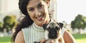 Animal Health - woman holding a dog